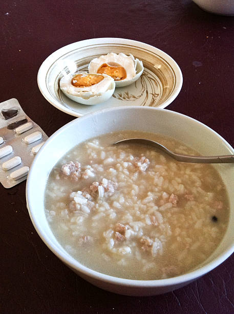 istock Pork boiled rice with salted eggs for sick patient 468116522