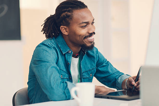 istock African-American Male Graphic Designer At Work. 468117306
