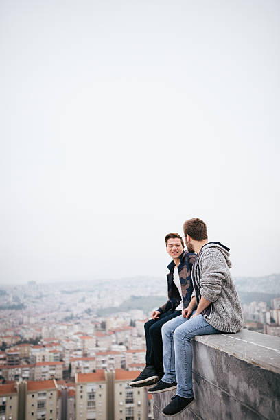 istock Best friend talking sitting with landscape 468119512