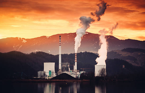 Coal-fired power plant destroying the environment with releases.