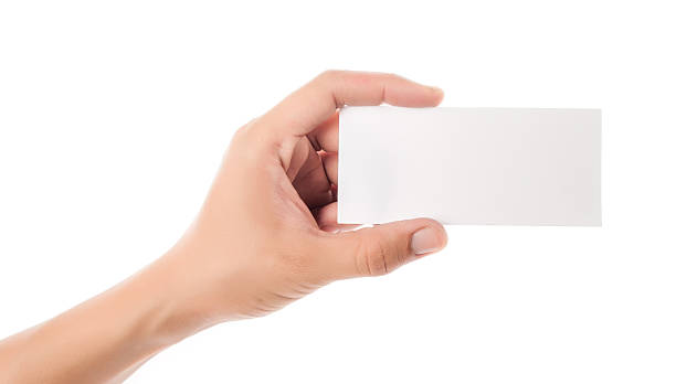 istock Hands hold business cards on white background 468124550