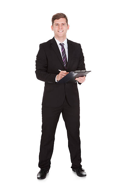 istock Happy businessman holding clipboard 468124595