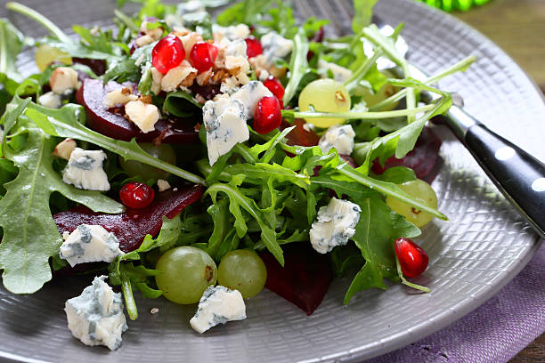 istock salad with beet, arugula and pomegranate 468124928