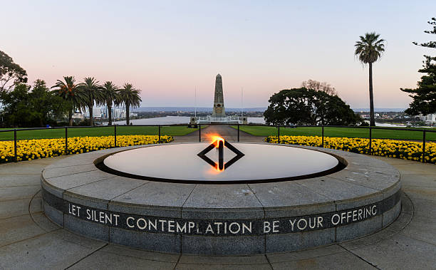 Kings Park War Memorial at Sunset Ultra wide angle view of the War Memorial and Eternal Flame in Kings Park, Perth, Australia at sunset. kings park stock pictures, royalty-free photos & images