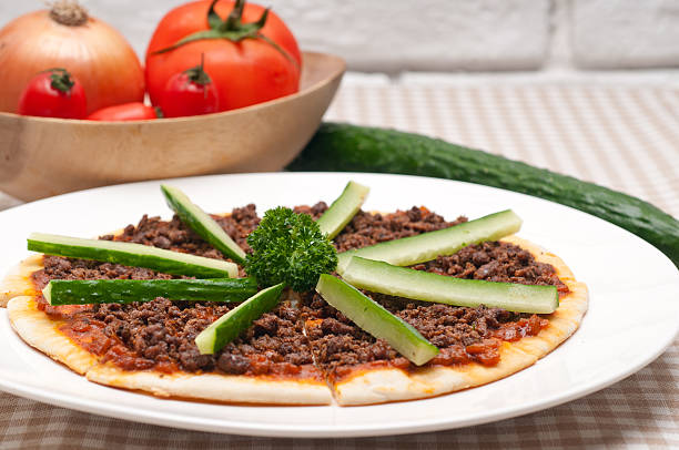 istock Turkish beef pizza with cucumber on top 468131577