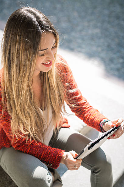 istock Woman with digital tablet 468132480