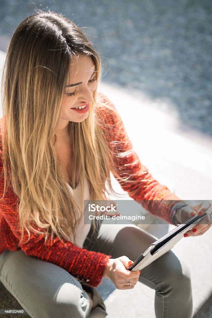 Woman with digital tablet Woman with digital tablet. 2015 Stock Photo