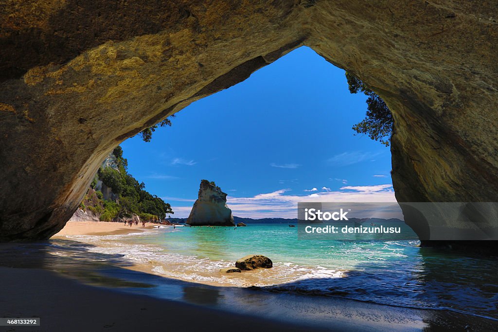 View of Cathedral Cove looking out onto ocean and blue sky Cathedral Cove / New Zealand New Zealand Stock Photo