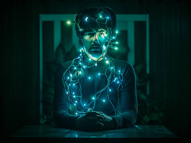 Man with christmas light