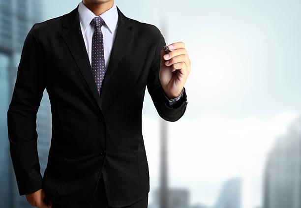istock Business man hand drawing in whiteboard 468134821