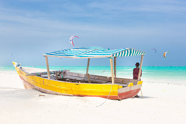 istock White tropical sandy beach on Zanzibar. 468136024