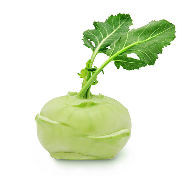 Kohlrabi with leaves on isolated white backround