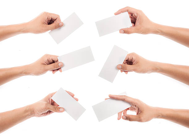 istock Hands holding white pieces of paper 468138824