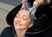 mature woman washing hair