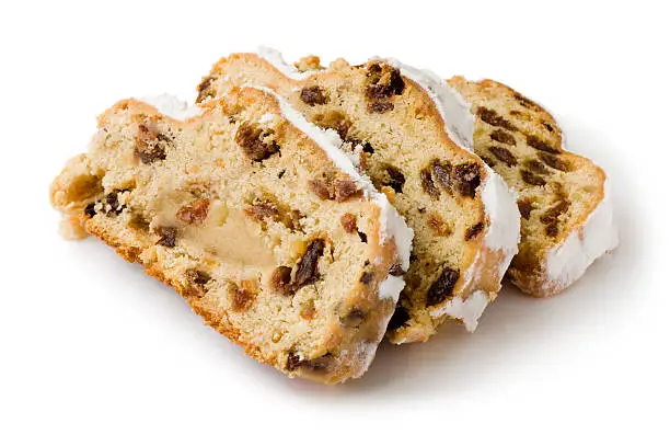 Slices of Stollen on a white background.