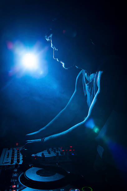 istock Disc jockey mixing music 468139294