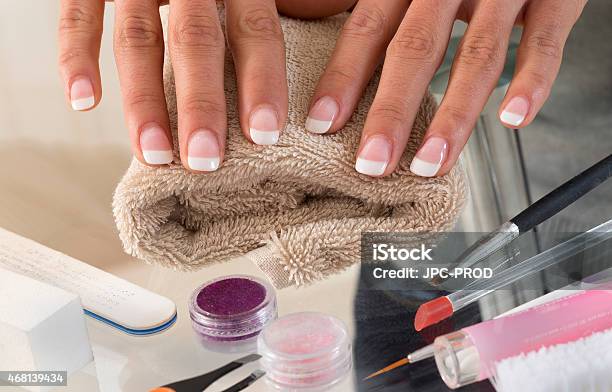 Hands Of Young Woman With French Manicure On The Towel Stock Photo - Download Image Now