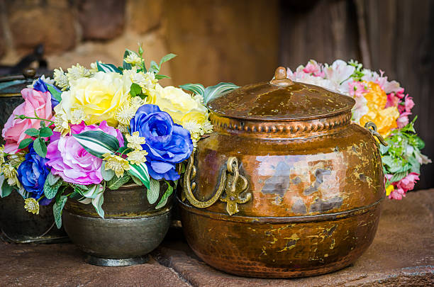 Bronze and flowers in vase