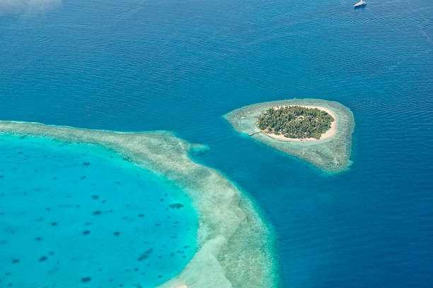 istock maldives aerial panorama blue water reef 468140678