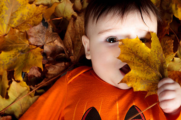 istock baby girl on leaf 468143392