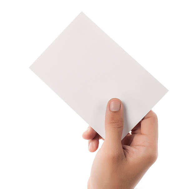 istock Hand holding paper isolated on white 468143564