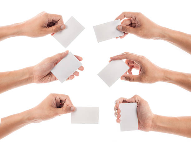 istock Six Hands Holding Business Cards, Isolated on White Backdrop 468143570