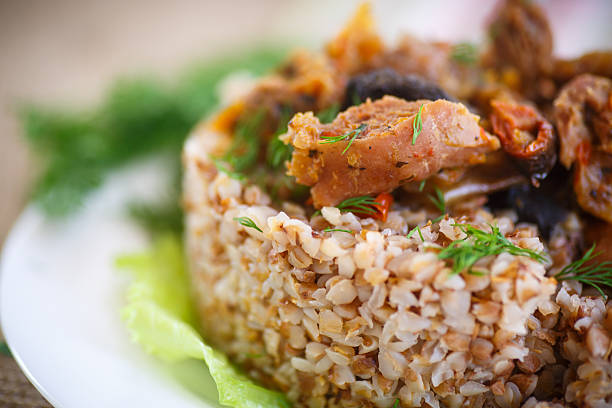 istock Boiled buckwheat with stewed chicken gizzards 468143956