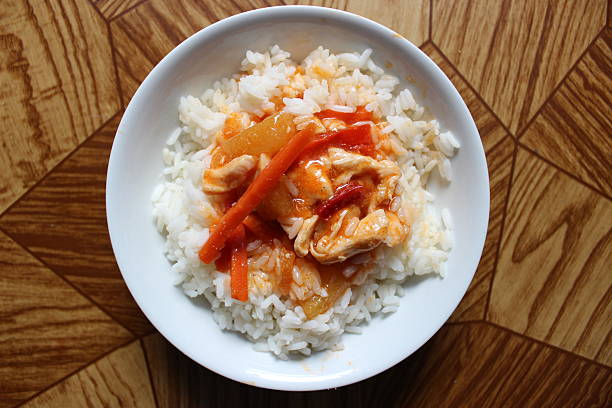 istock Sweet and sour meat-vegetable sauce with rice 468144406