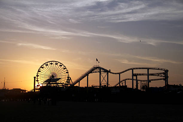 istock Amusement park and Sunset by the Beach 468144436