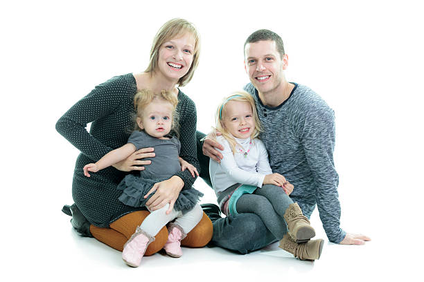 istock young family on white background 468144866