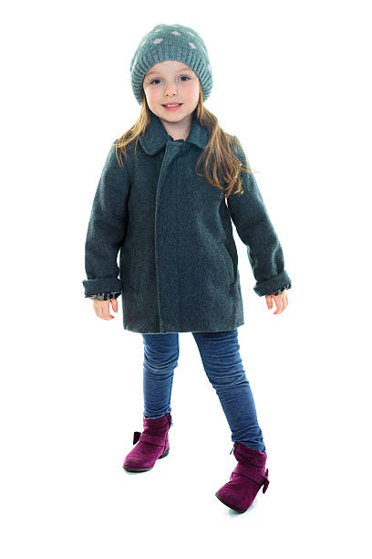 istock little girl in a knitted gray hat 468145356