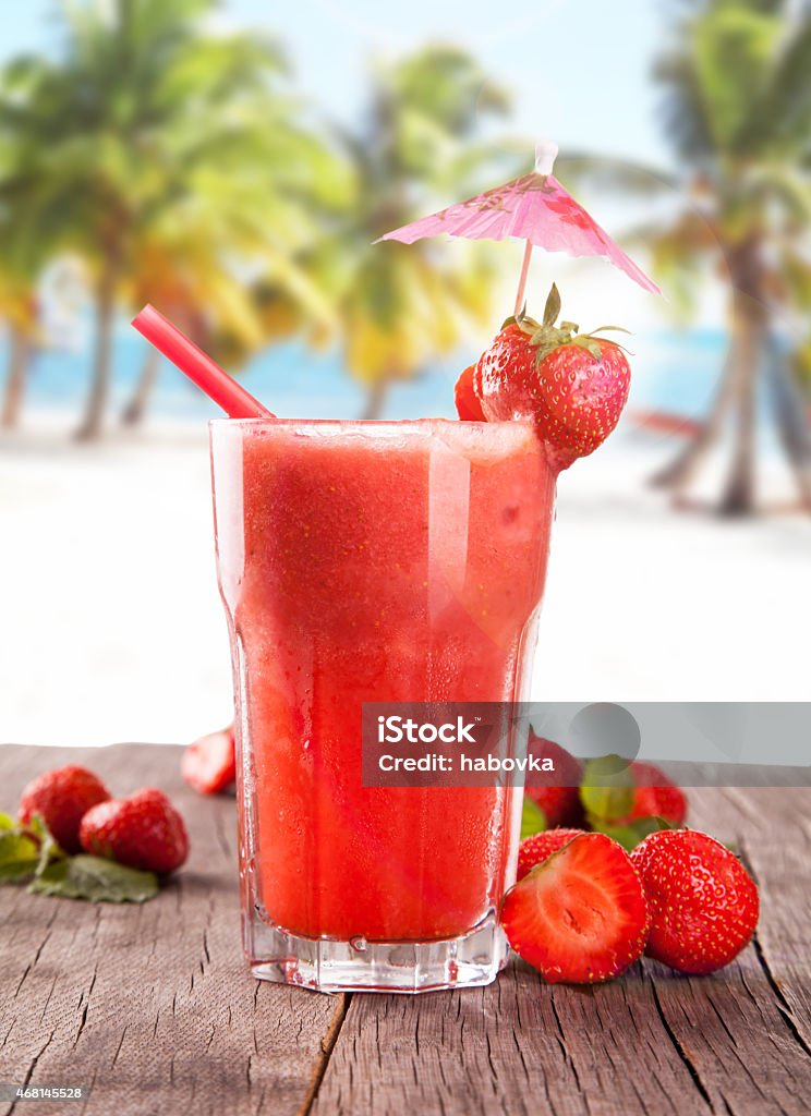 fresh drink Red currant cocktail on wooden table with beach background, summer concept, fresh fruits 2015 Stock Photo