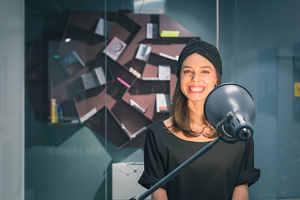 istock Beautiful young brunette posing in an office 468145658
