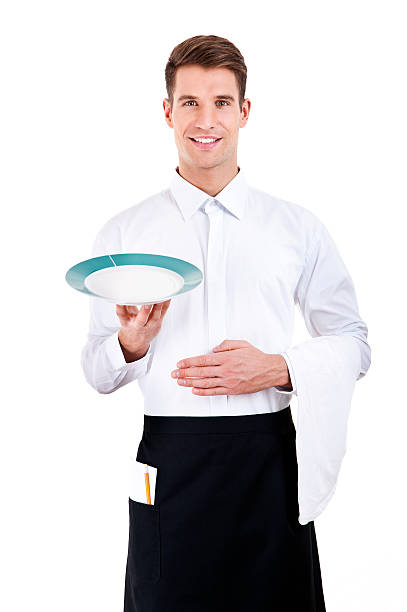 Professional waiter holding an empty dish. Isolated on white stock photo