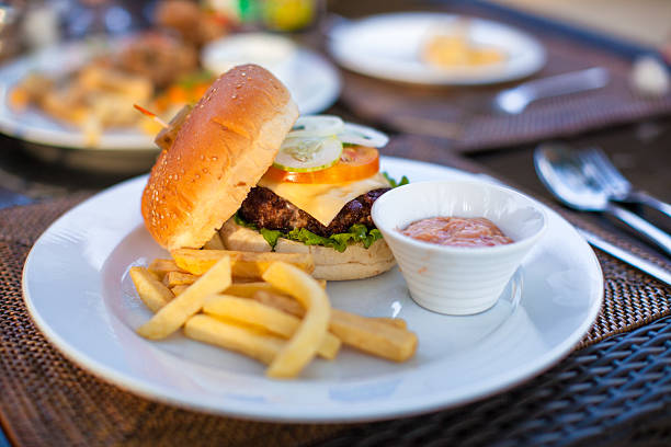 istock Burger and fries on white plate for lunch 468148417