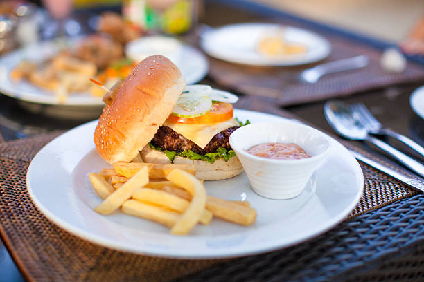 istock Burger and fries on white plate for lunch 468148467