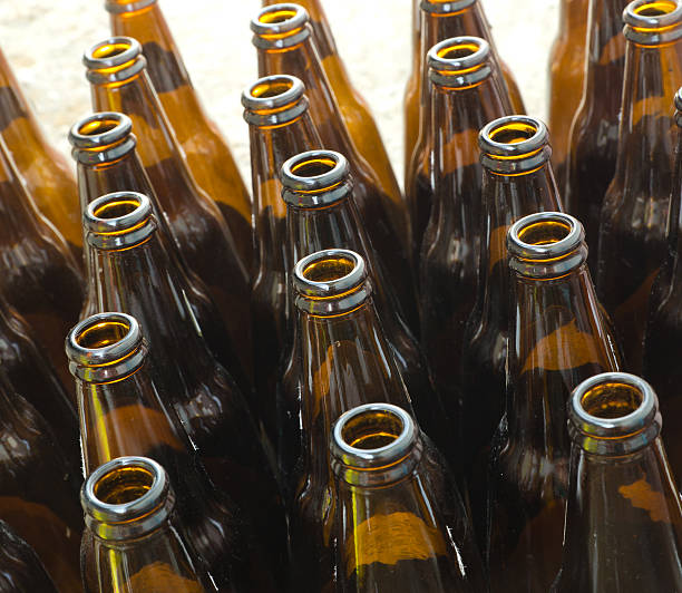 istock bottles of brown glass 468148730