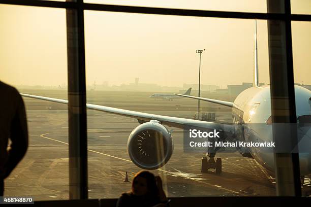 Passenger Airplanes Seen Through Window Of The Airport In Warsaw Stock Photo - Download Image Now