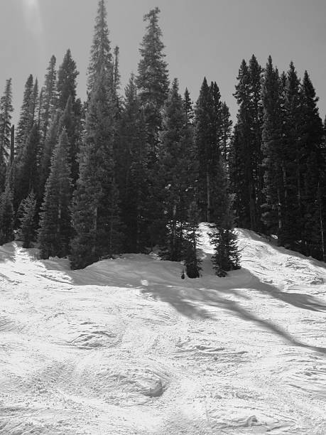 istock Black and white moguls with lens flare sunbeam 468149342