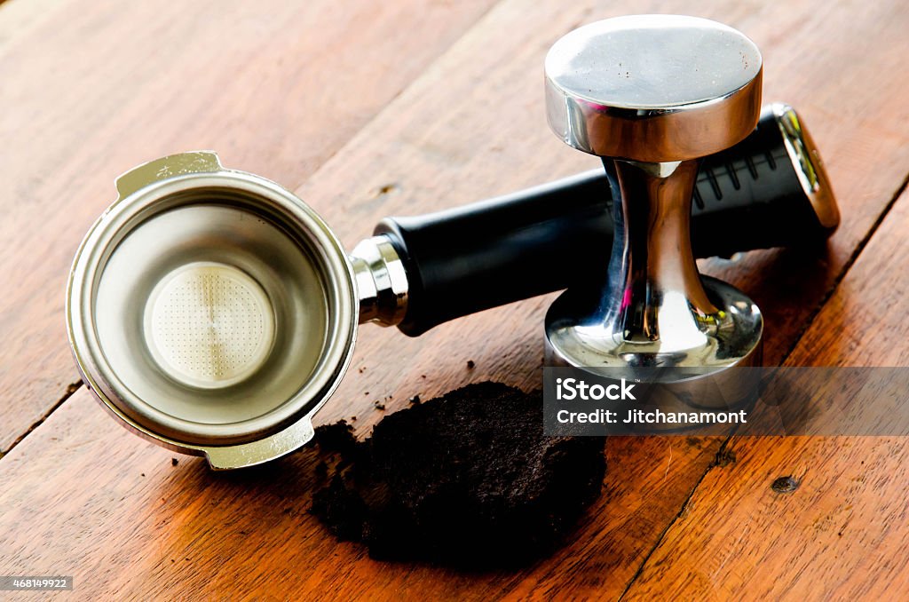 coffee filter holder and tamper on wood table 2015 Stock Photo