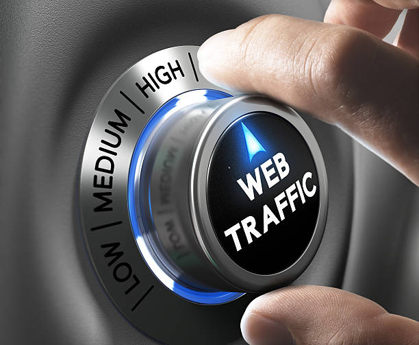 Website Traffic Web traffic button pointing high position with two fingers, blue and grey tones, Conceptual image for internet seo. web traffic stock pictures, royalty-free photos & images