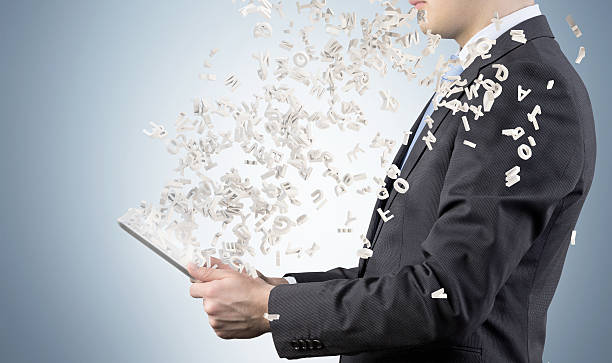 istock businessman holding touch pad 468153870