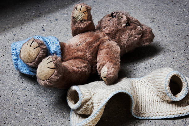 stripped teddy Stripped teddy on concrete floor hostage photos stock pictures, royalty-free photos & images