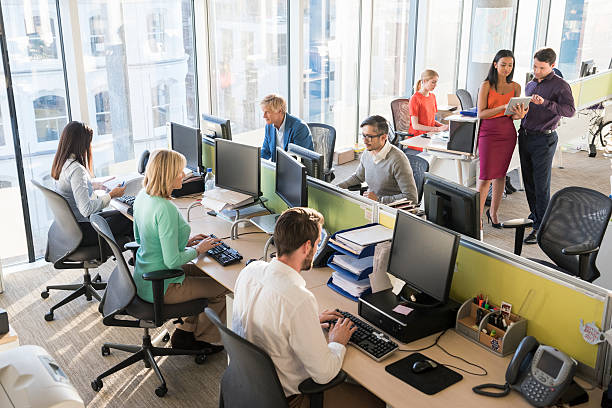 istock Multi-ethnic business people working together in office 468157896