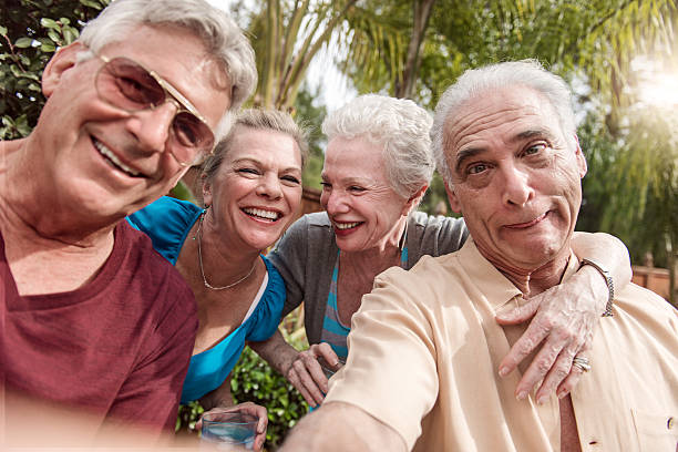 istock Group of senior people taking selfie 468158398
