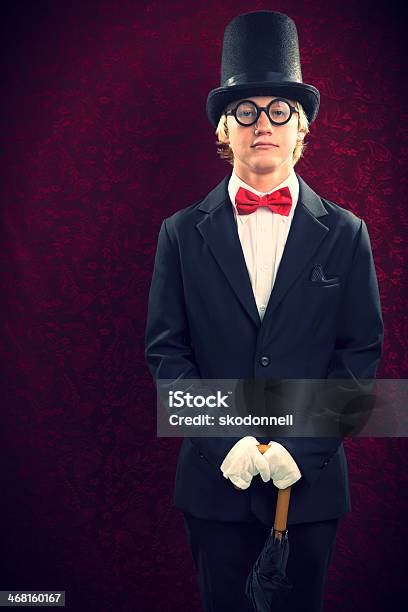 Boy Standing In Front Of Wallpaper Stock Photo - Download Image Now - Bow Tie, Retro Style, Suit