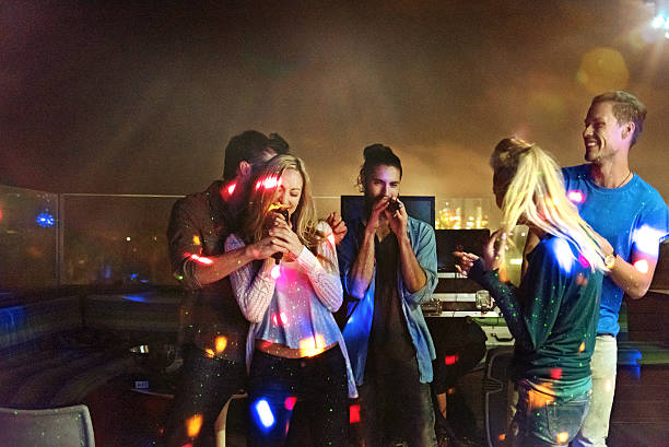 istock Group of friends doing karaoke 468161586