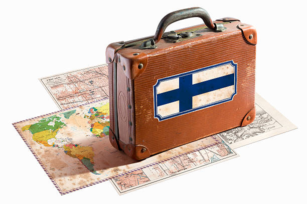 istock Antique leather suitcase with Finland flag on maps 468161669