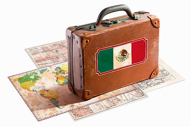 istock Antique leather suitcase with Mexico flag on maps 468161677