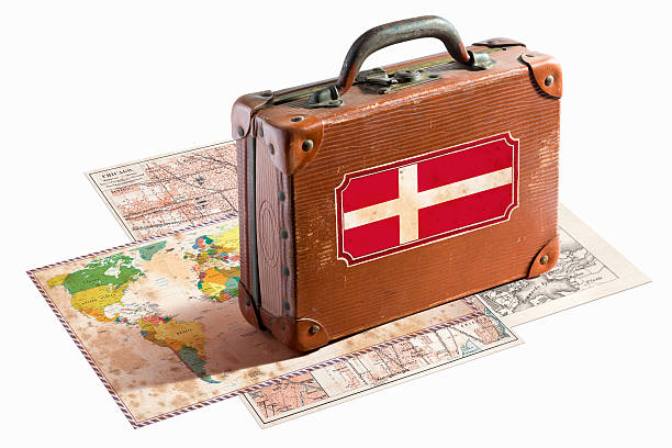 istock Antique leather suitcase with Denmark flag on maps 468161763